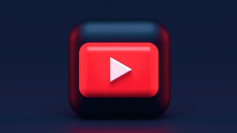 Video play button icon on a dark background